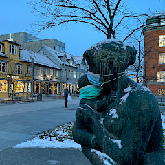 Masked statues in Tromsø, Norway during the polar night.